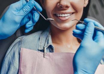 Is it better to get a dental crown or remove the tooth?